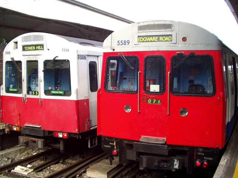 Two different district line trains at Wimbledon Railway Station